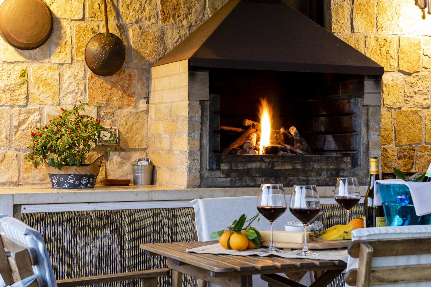 The fireplace at Casa Natia in the evening